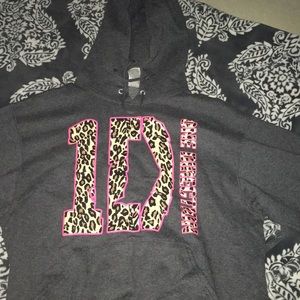 Gray hooded sweatshirt and it is customized.